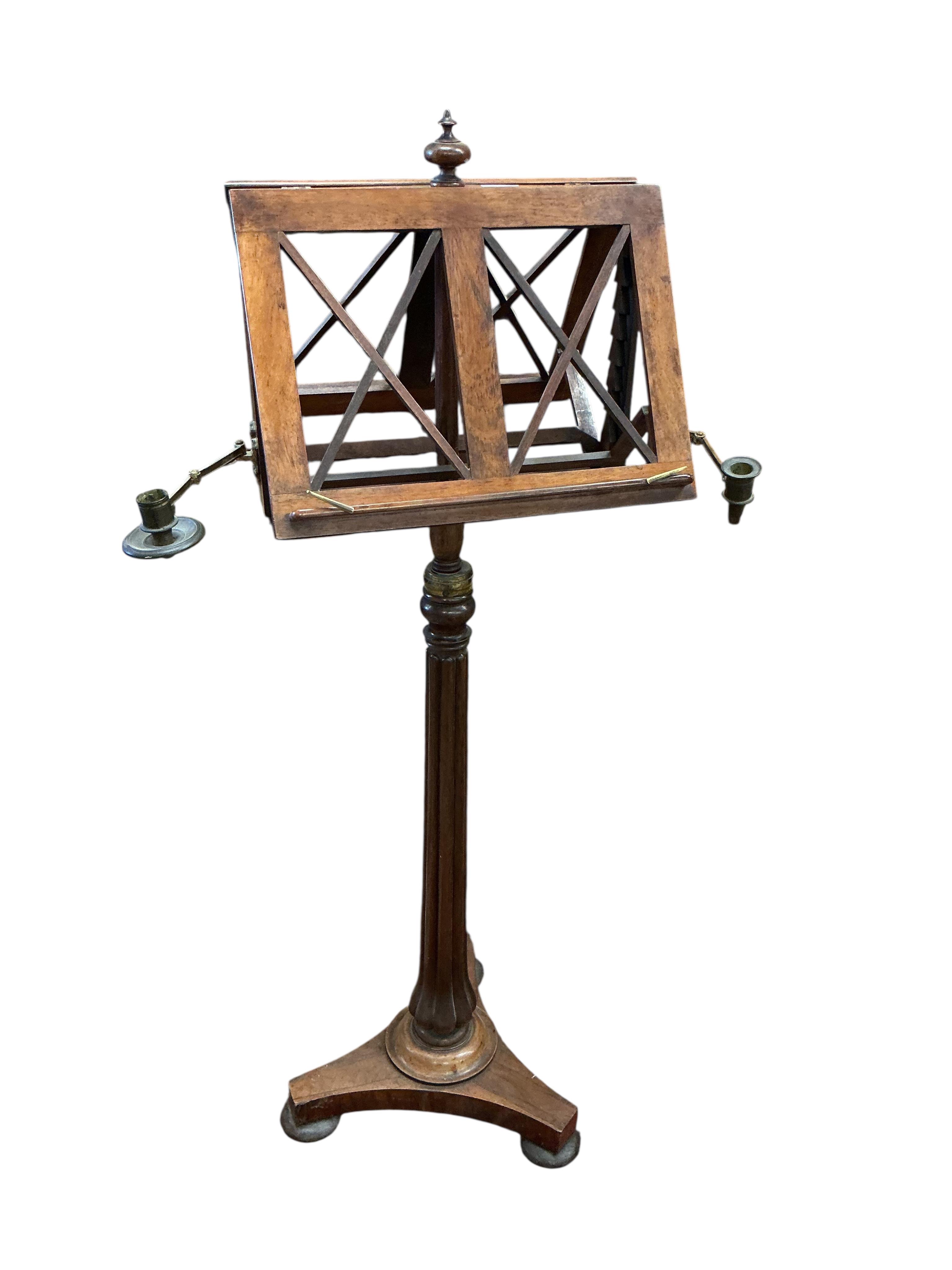 An early Victorian rosewood duet music stand together with a gilt painted wrought iron music stand
